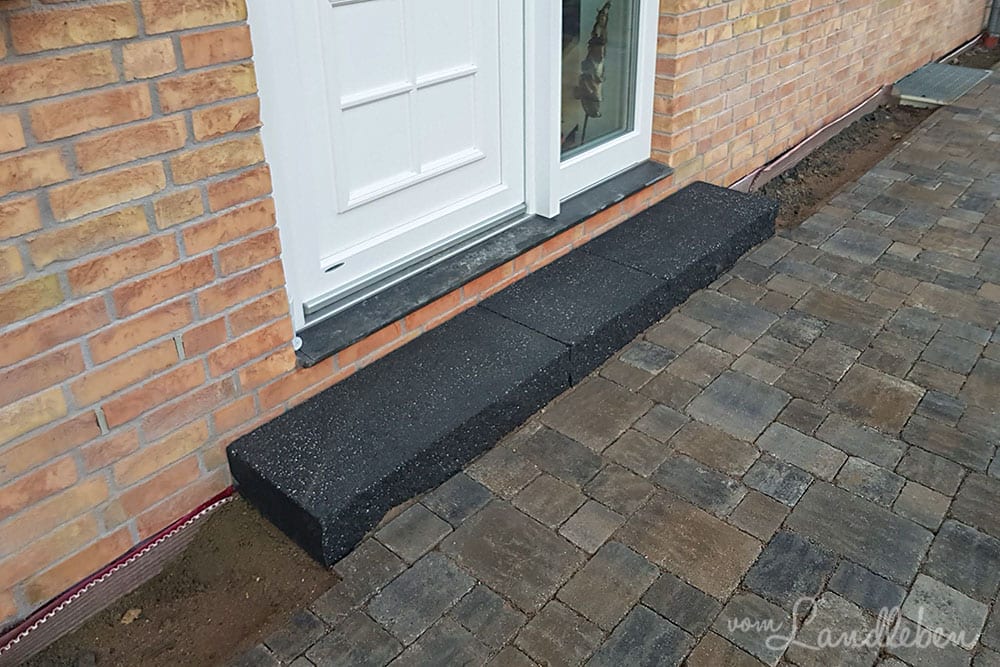 Pflastern: Stufe an der Haustür