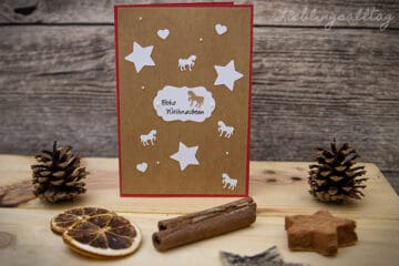 Selbstgebastelte Weihnachtskarte mit Pferden