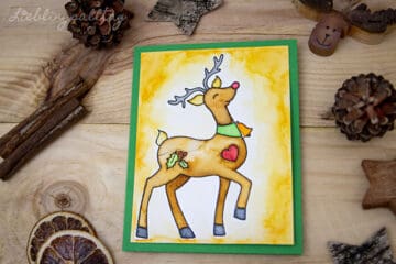 Selbstgebastelte Weihnachtskarte mit Rudi Rentier