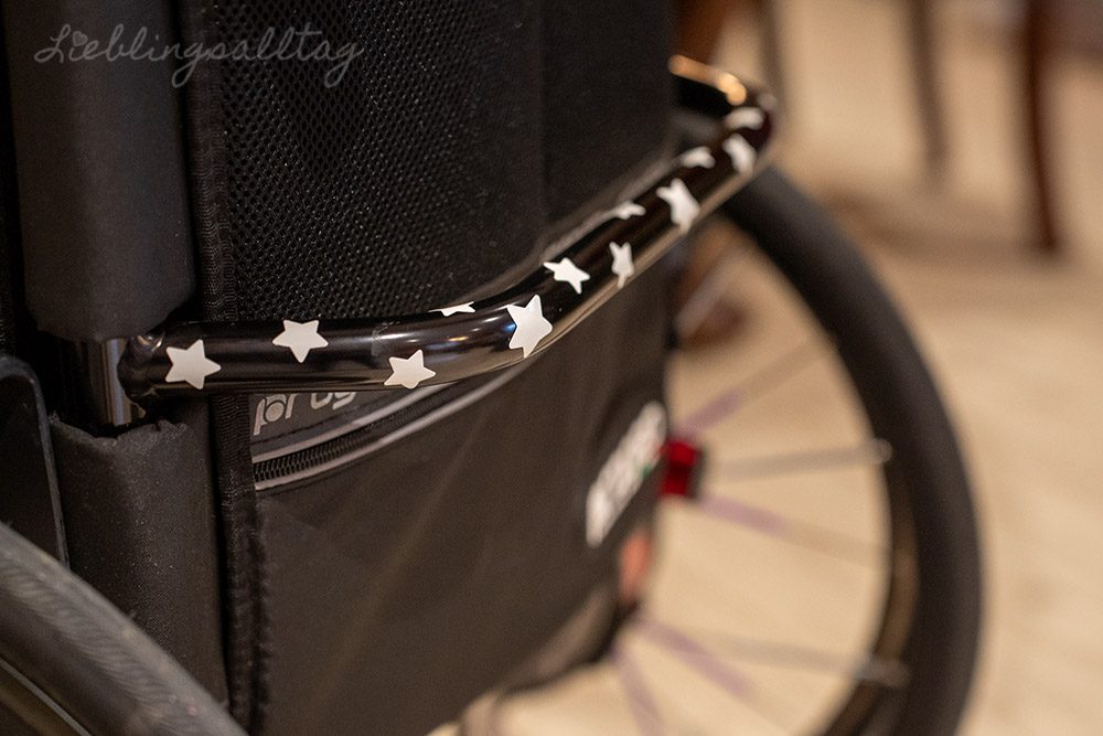 Leuchtsterne am Rollstuhl